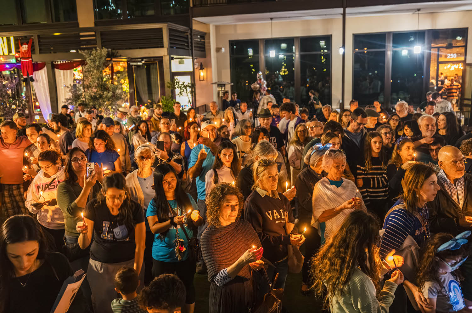 Community candle lighting in downtown Winter Garden
